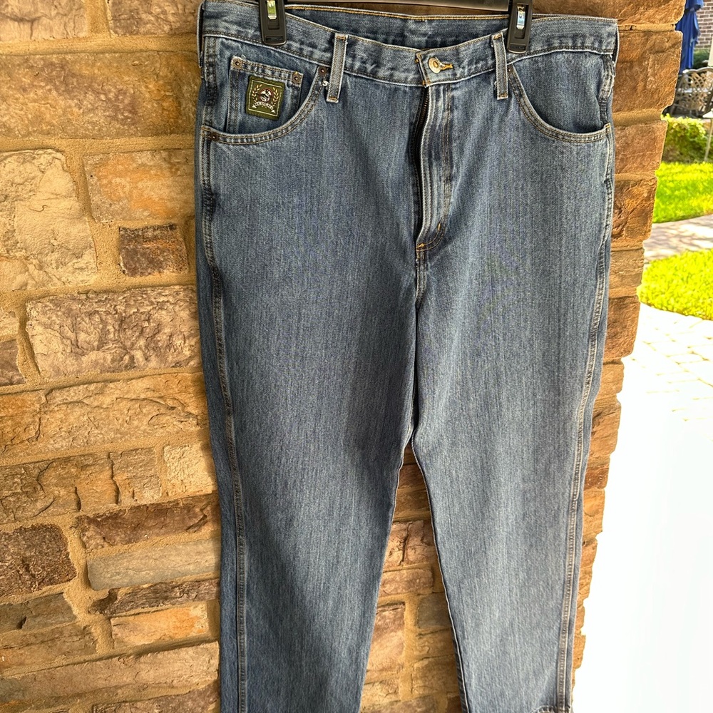Men’s 36x34 Cinch relaxed fit jeans.  Medium stone wash.  100% Cotton